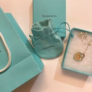 Tiffany necklace! Never worn includes velvet bag, gift box, and gift bag.